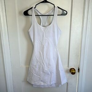 TNA Action (Aritzia) - White tennis dress with open back - Size Medium
